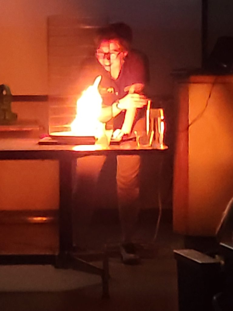 Schiele staff experimenting with fire